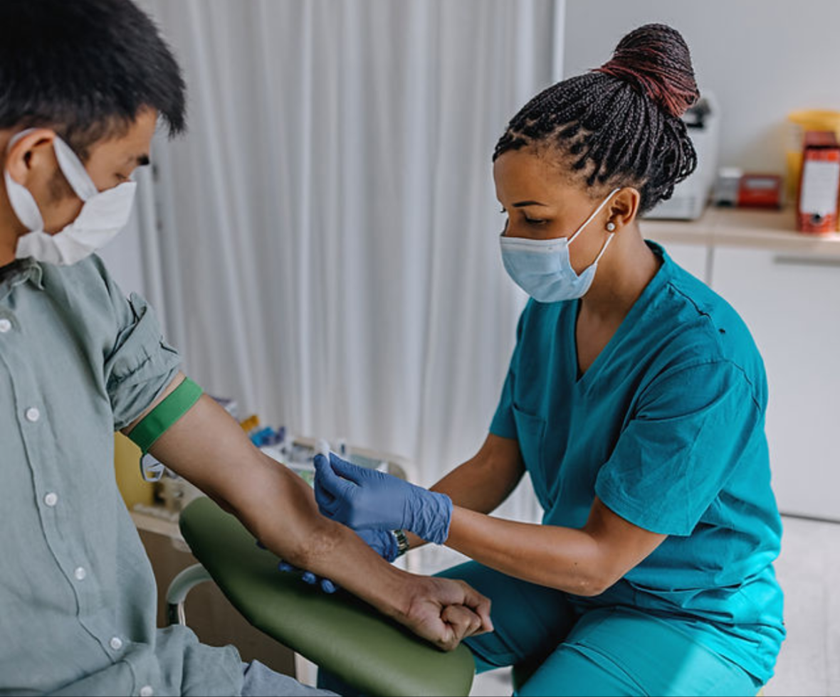 Medical professional drawing patient's blood--Fast & Easy Mobile Labs